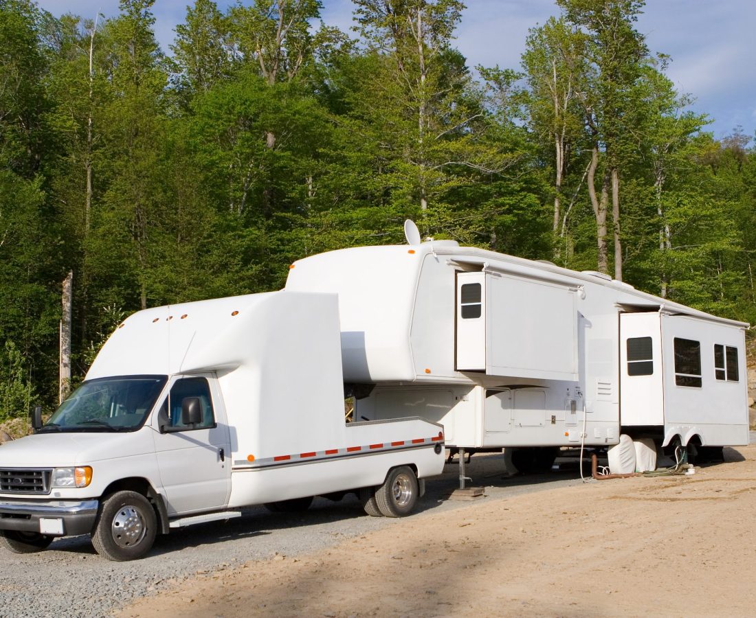 Fifth wheel trailer parked at a campground